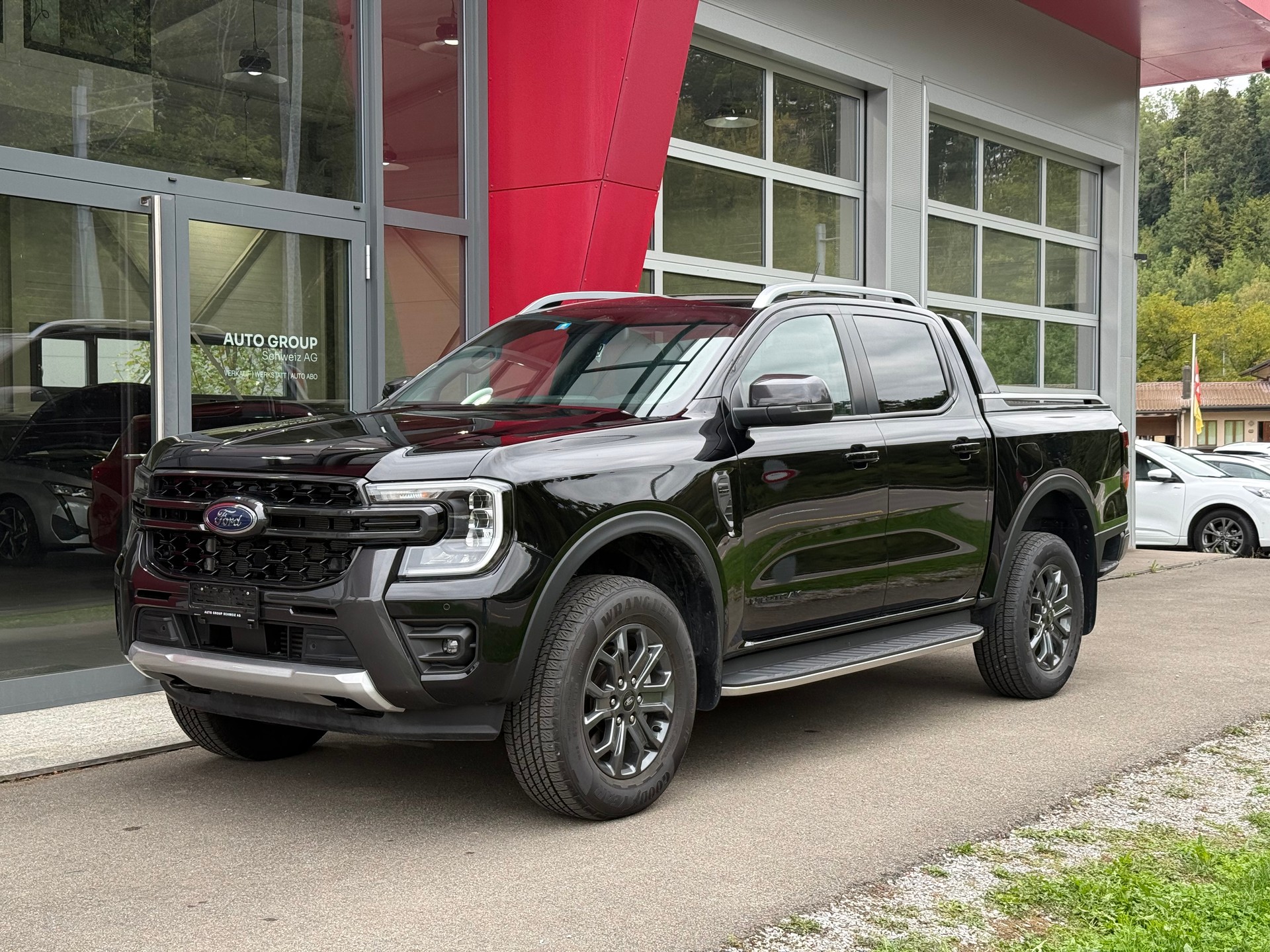 FORD Ranger Wildtrak 2.0 Eco Blue e-4WD Automat LEASING AB 734.67 CHF / MONAT-image-0