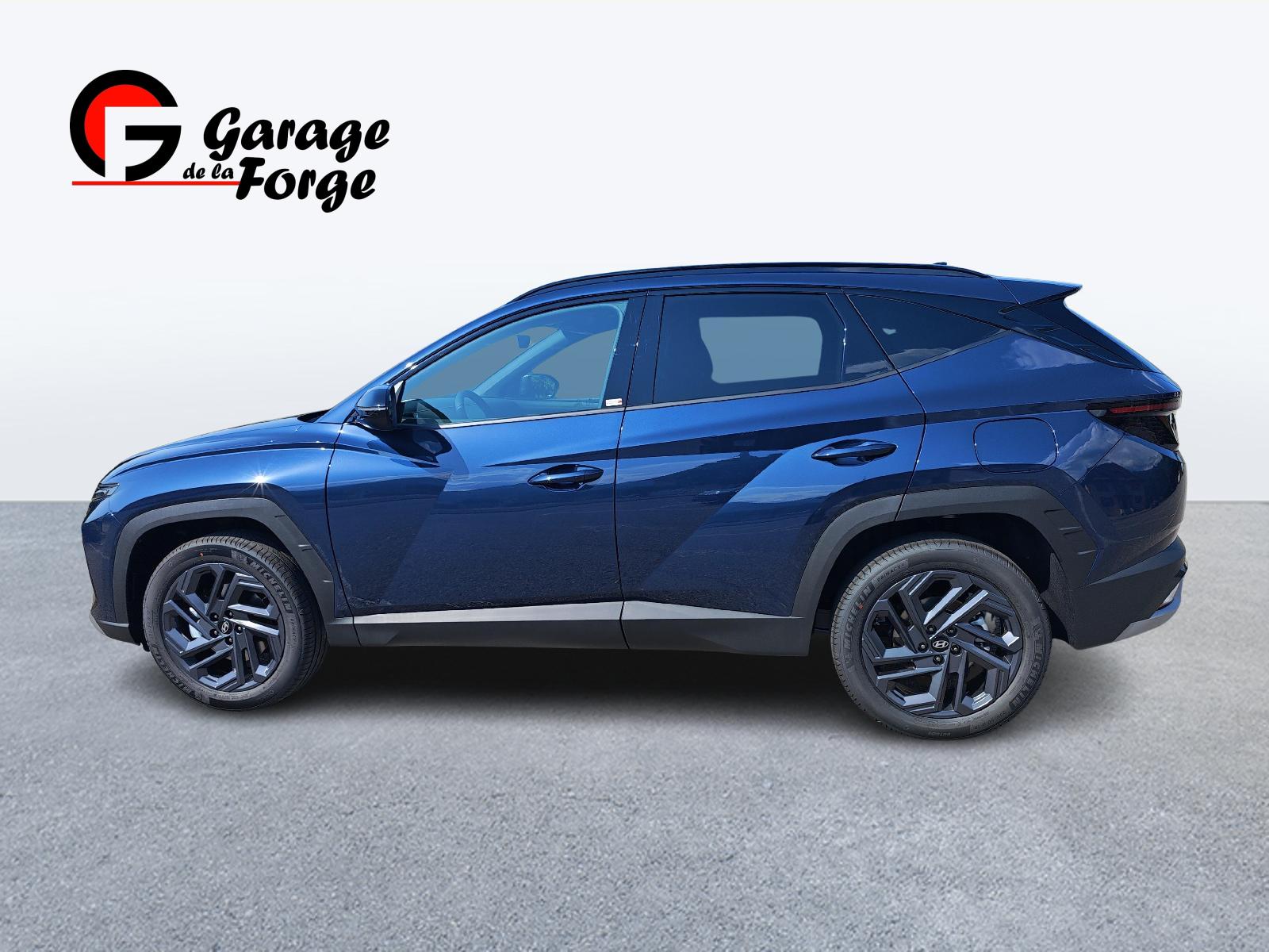 HYUNDAI Tucson 1.6 T-GDi HEV Origo Blackline 4WD Sailing Blue-image-1