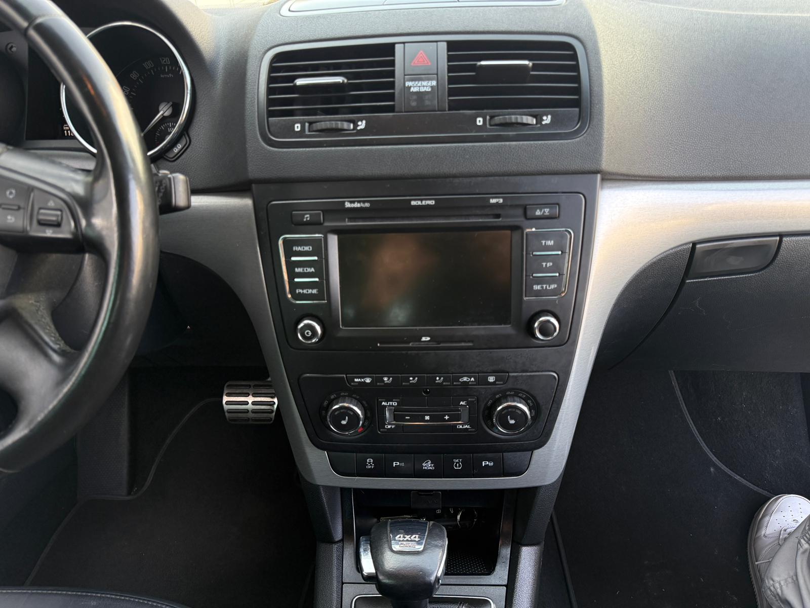 SKODA Yeti 2.0 TDI AllDrive 4x4 DSG-image-12