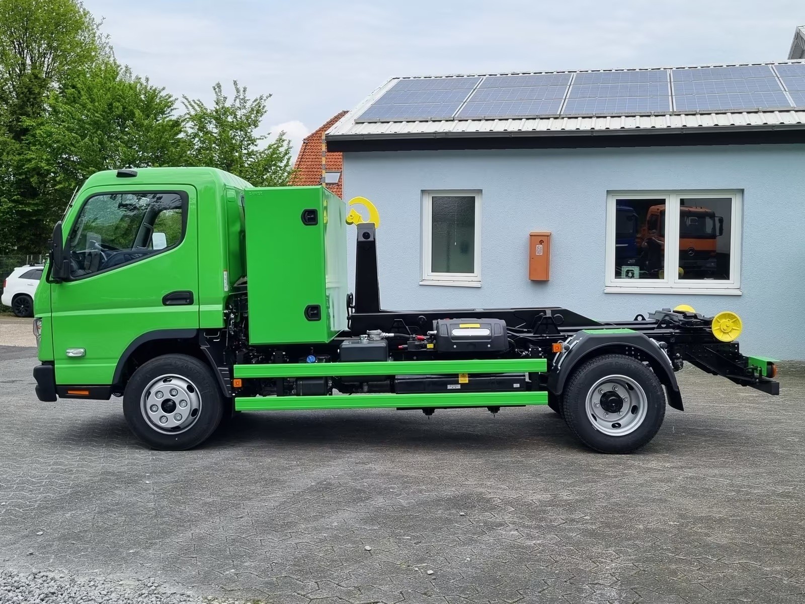 MITSUBISHI FUSO Canter FUSO 9C18 City Abrollkipper-image-1