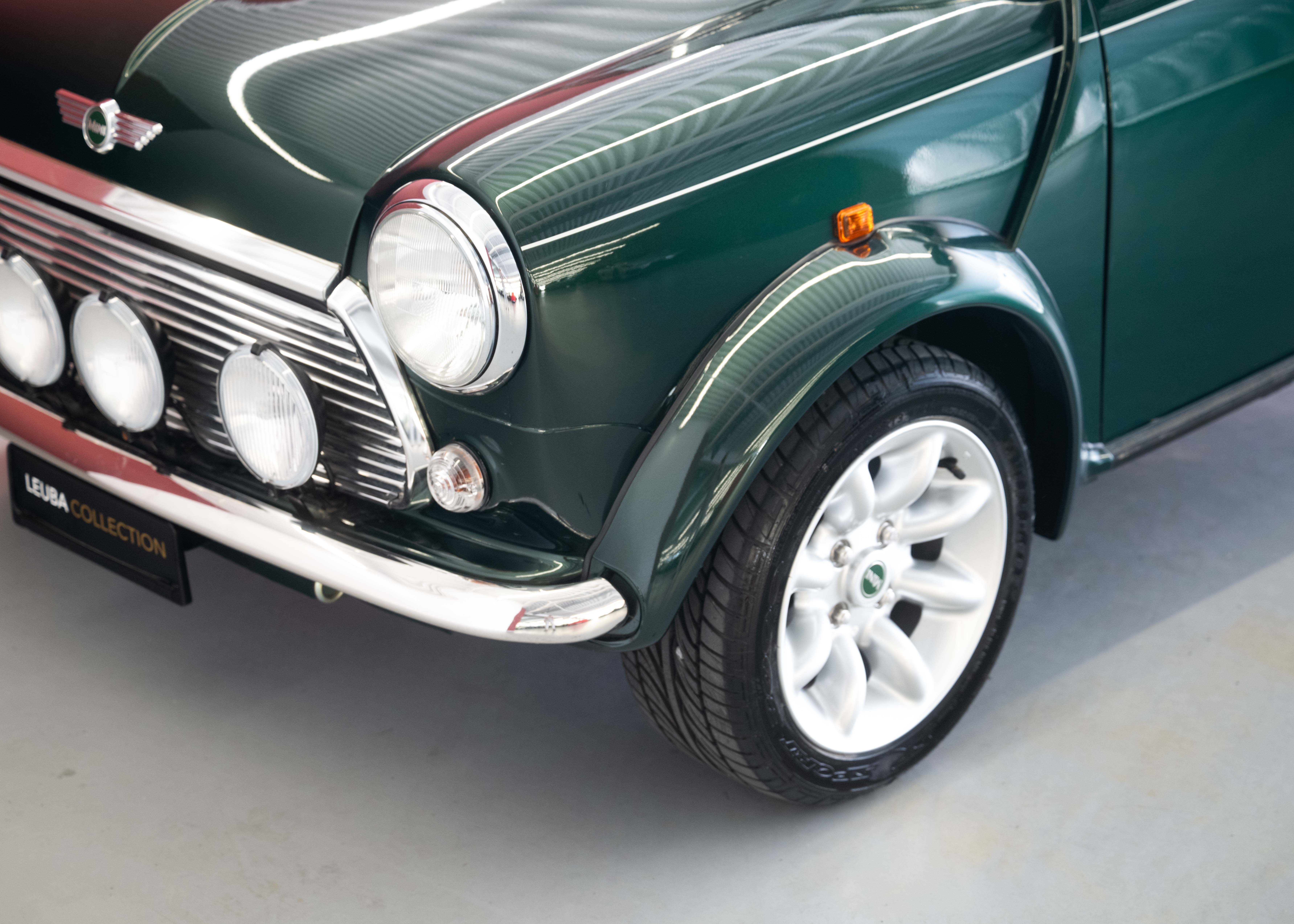 Image MINI MINI 1.3i Knightsbridge (1st hand Swiss car, as new, certified very low mileage, sunroof, collector item)
