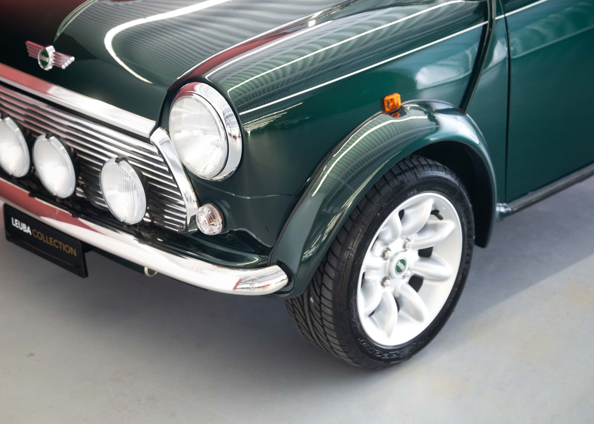 MINI 1.3i Knightsbridge (1st hand Swiss car, as new, certified very low mileage, sunroof, collector item)-image-13