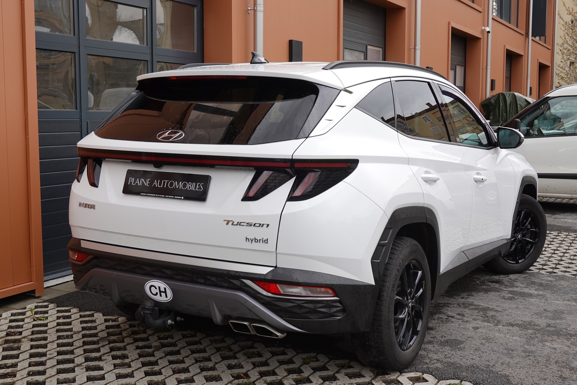 HYUNDAI Tucson 1.6 TGDI HEV Amplia 4WD - "CH Auto * 8 Roues * Caméra * Trempomat Adaptitif"-image-6