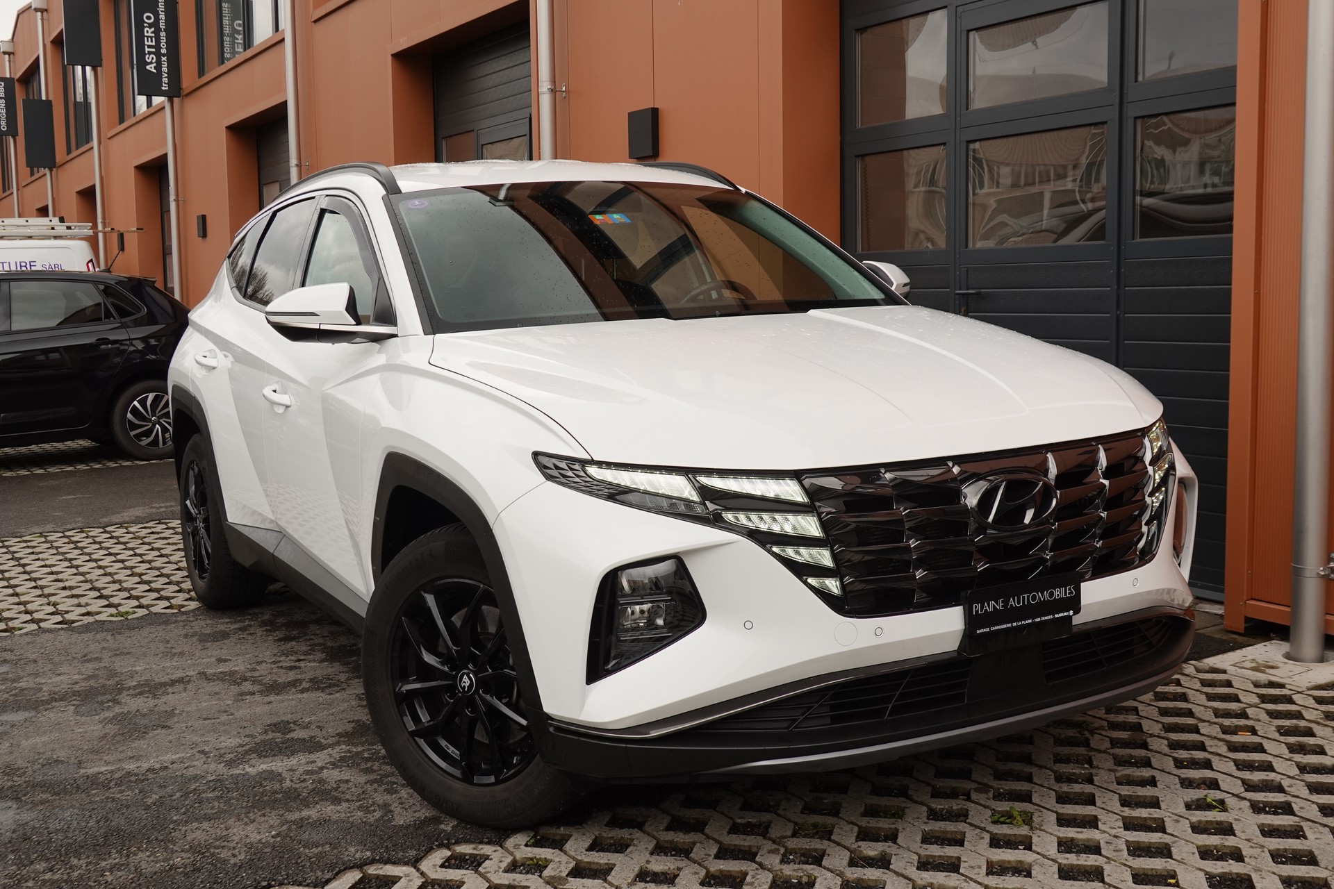 HYUNDAI Tucson 1.6 TGDI HEV Amplia 4WD - "CH Auto * 8 Roues * Caméra * Trempomat Adaptitif"-image-5