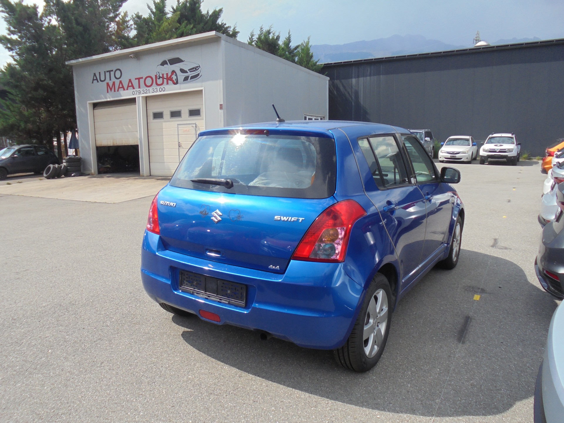 SUZUKI Swift 1.3i 16V GL Top 4x4-image-3