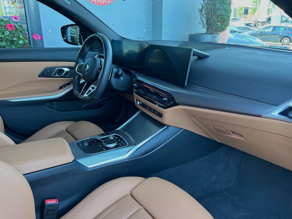 BMW 320d xDrive 48V Touring Steptronic M Sport-image-9