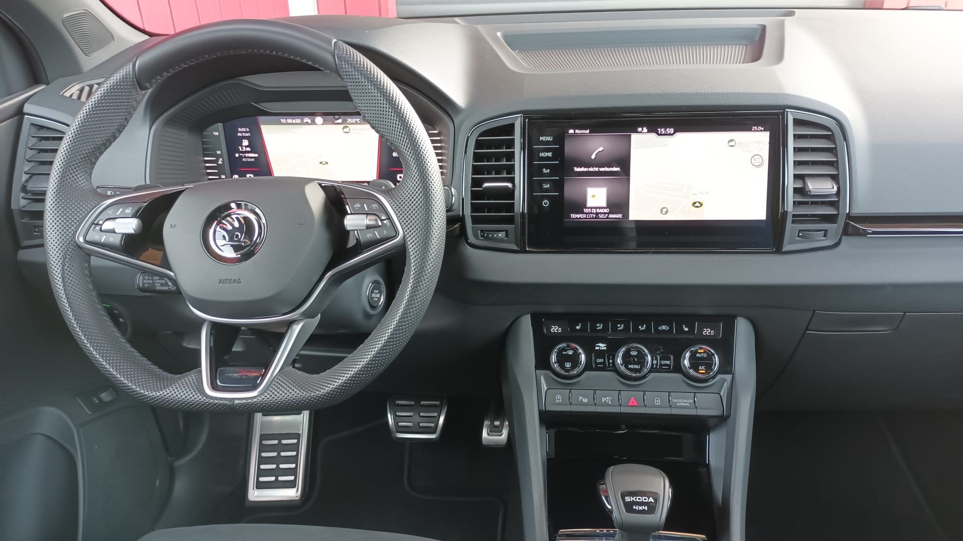 SKODA Karoq 2.0 TSI SportLine 4x4 DSG-image-9